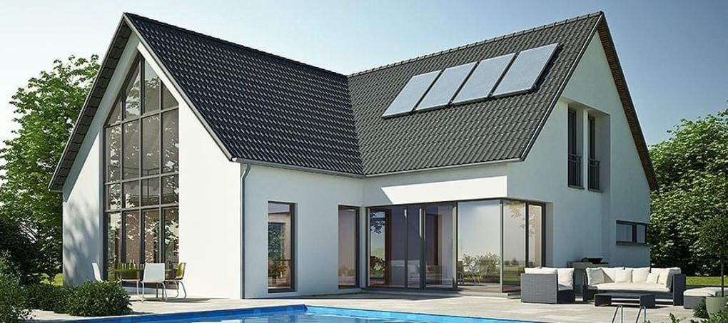 Casa con tetto e serramenti in alluminio grigio