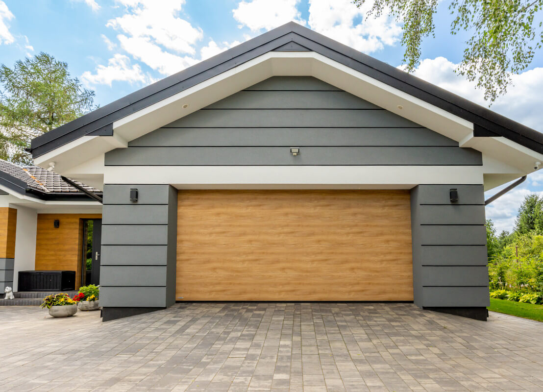 Porta sezionale per garage effetto legno